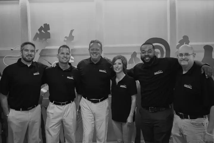 Garfield 1-2323 team members in company polos